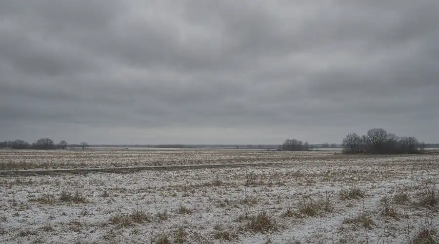 february landscape distant view with clouds
